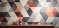 A wallpapered wall with a geometric pattern