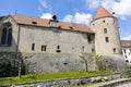 Walls of a castle and its massive tower