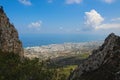 Between the walls of the castle of Saint Hilarion, you can see the city of Kyrenia and the Mediterranean sea. Cyprus Royalty Free Stock Photo