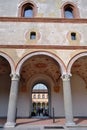 Walls, columns and arcades of the ancient medieval fortress Rocchetta inside the Sforza castle in Milan.