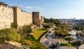 Walls and flanks of Tower Of David citadel with Old City walls over Hativat Yerushalayim street in Jerusalem in Israel