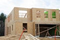 the walls of the new house are covered with plywood frame wood Royalty Free Stock Photo