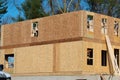 the walls of the new house are covered with plywood frame wood Royalty Free Stock Photo