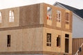 the walls of the new house are covered with plywood site work Royalty Free Stock Photo