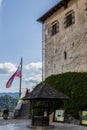 Walls of an old castle on the shore of Lake Bled in Slovenia against the sky Royalty Free Stock Photo