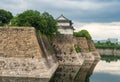 Walls of Osaka Castle with water reflections Royalty Free Stock Photo