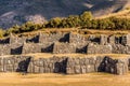 Walls of Sacsayhuaman archeological site at sunset, Cusco, Peru Royalty Free Stock Photo