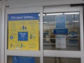 Walmart entrance social distancing covid19 coronavirus signage, August 12, 2020 Canada