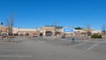 Walmart grocery store exterior clear blue sky empty parking lot Royalty Free Stock Photo