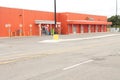 tor, canada - august 18, 2023: walmart pickup area orange building side of walmart with all empty parking spots 30 p 20