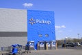 Walmart Pickup area of the store with blue sky and clouds