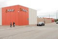 tor, canada - august 18, 2023: walmart pickup sign logo on corner of orange walmart store building with car 27 p 20