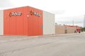 tor, canada - august 18, 2023: walmart pickup sign logo on corner of orange walmart store building with people 28 p 20