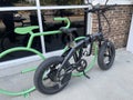 Walmart retail store exterior electric bike secured to a stand