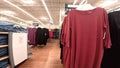 Walmart super center interior long pan apparel area seasonal change to Winter in Georgia red shirts