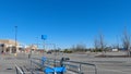 Walmart supercenter exterior clear blue sky shopping cart coral