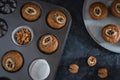 Walnut and banana muffins in a baking tray. Top view Royalty Free Stock Photo