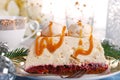 Walnut cream cake with meringue and caramel sauce for christmas