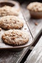 Walnut crumb sweet potato muffins on barn wood table Royalty Free Stock Photo