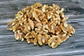 The walnut, an edible seed of any tree of the genus Juglans (family Juglandaceae), used as a snack and in desserts