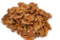 The walnut, an edible seed of any tree of the genus Juglans (family Juglandaceae), used as a snack and in desserts