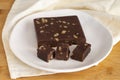 Walnut halva. Halva on wooden background. Close up