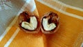 Walnut halves in the form of hearts. Love concept