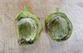 walnut husk on a scratched wood background Royalty Free Stock Photo