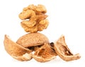 Walnut kernel and walnut peel isolated on white background. Whole and broken walnuts Royalty Free Stock Photo