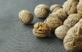 Walnut kernel with shell on wooden backdrop. healthy food for brain. walnut background Royalty Free Stock Photo