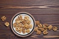 Walnut kernels on brown wooden table