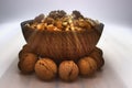 Walnut Kernels In Clay Bowl Other Names: Juglans Regia, Persian Walnut, English Walnut, Circassian Walnut. Isolated Image On A Royalty Free Stock Photo