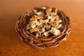 Walnut kernels in snall wicker basket Royalty Free Stock Photo