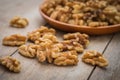 Walnut kernels on wooden table Royalty Free Stock Photo