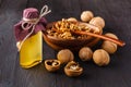 Walnut oil in bottle and nuts. Selective focus Royalty Free Stock Photo