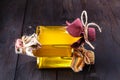 Walnut oil in bottle and nuts. Selective focus Royalty Free Stock Photo