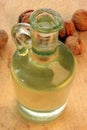 Walnut oil in a glass bottle Royalty Free Stock Photo