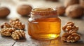 Walnut oil in a glass jar Royalty Free Stock Photo