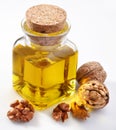 Walnut oil with nuts Royalty Free Stock Photo