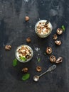Walnut and salted caramel ice-cream in glass jars Royalty Free Stock Photo
