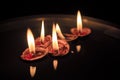 Walnut Shells with Lit up Candles Royalty Free Stock Photo