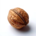 A walnut on a white surface with a white background Royalty Free Stock Photo