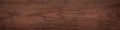 Walnut wood texture. Natural texture background of North American walnut wood board. Long wood plank texture.