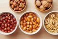 Walnuts, almonds and hazelnuts soaking in water Royalty Free Stock Photo