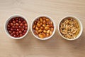 Walnuts, almonds and hazelnuts soaking in water