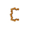 C letter made of walnuts Royalty Free Stock Photo