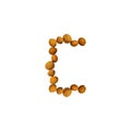 Abstract C letter made of walnuts Royalty Free Stock Photo