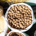 Walnuts in a bag for sale in the market.