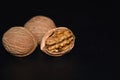 Walnuts on a black background