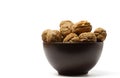 walnuts in a brown bowl Royalty Free Stock Photo